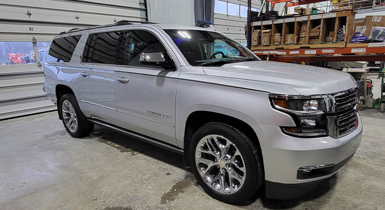 Silver SUV parked inside garage